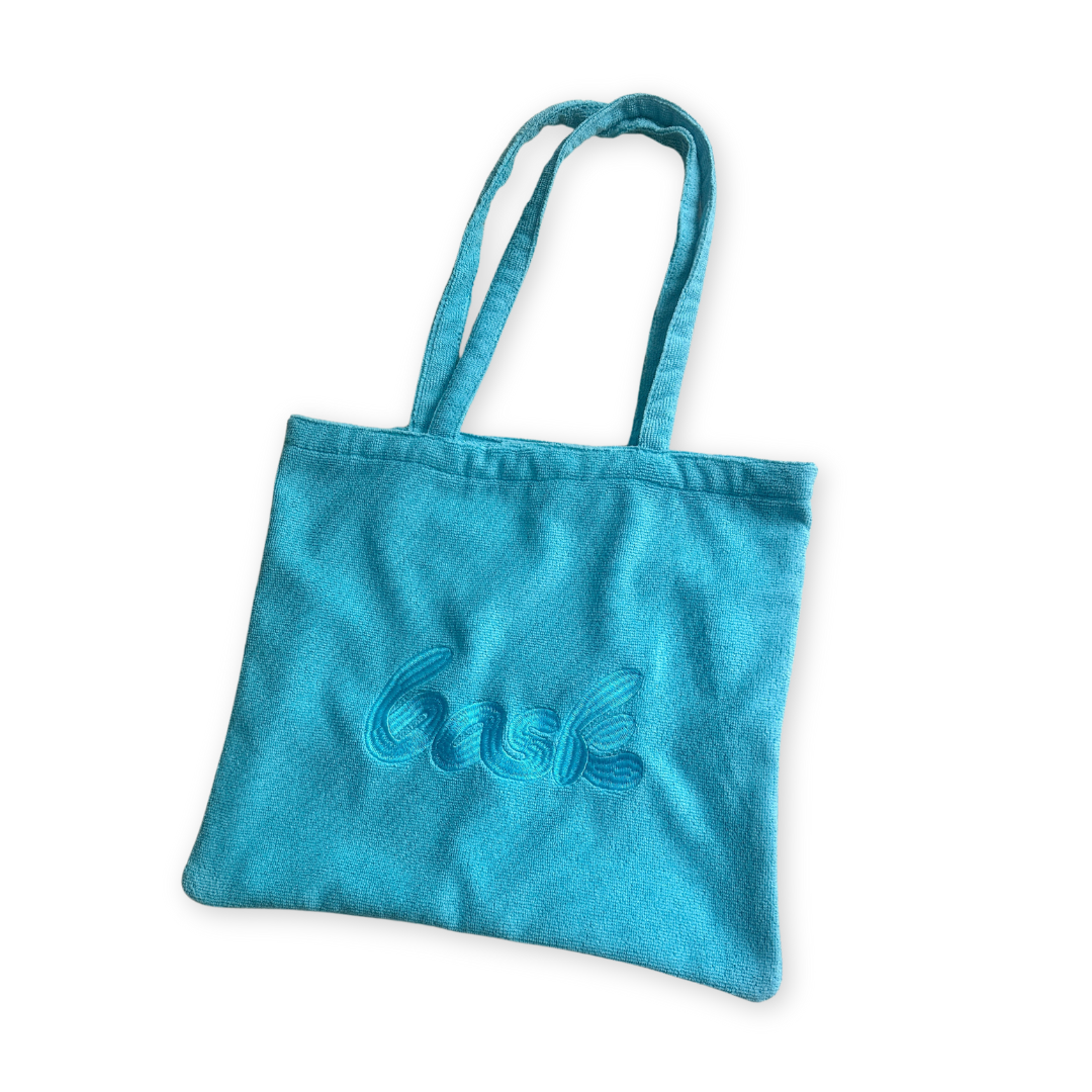 The Bask Terry Cloth Tote in Wavy Baby Blue Bask Suncare